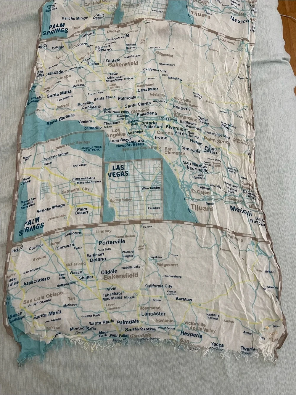 kate spade off the map West Coaat print lightweight scarf in aqua and white
